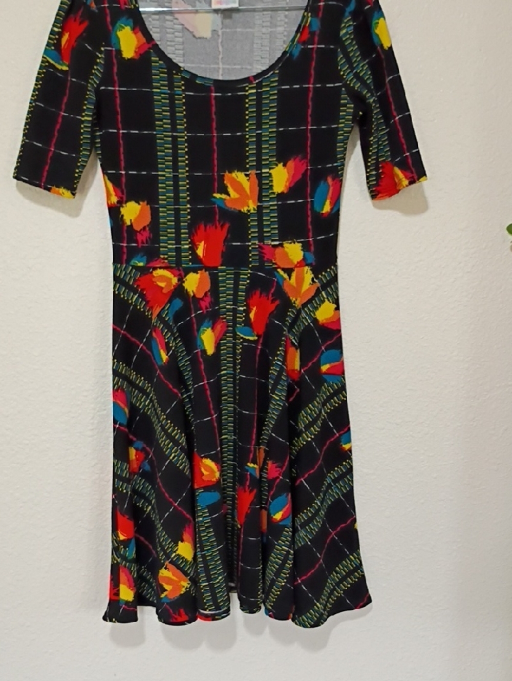 LuLaRoe Black Floral Plaid Scoop Midi Dress with Red Yellow Blue Accents
